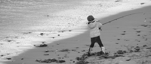 Young Man Fishing Whitley Bay beach Jolyon Yates
